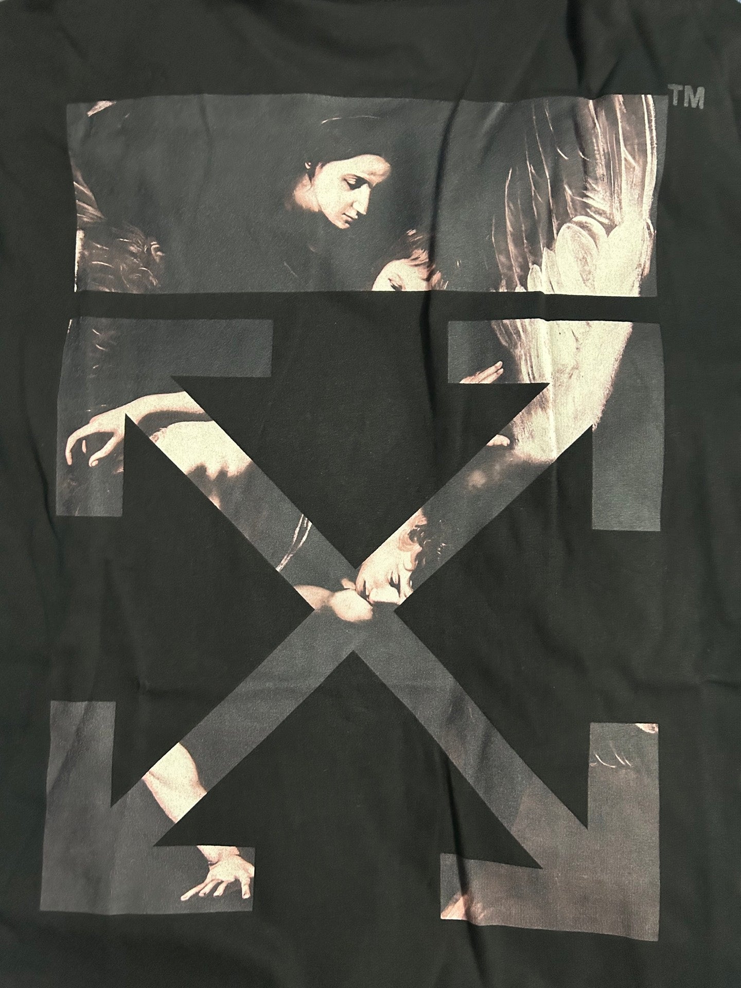 Black Off-White graphic T-shirt with large X and portrait print