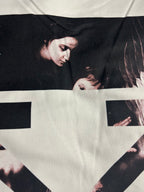 Off-white T-shirt with close view of black-and-white graphic across front