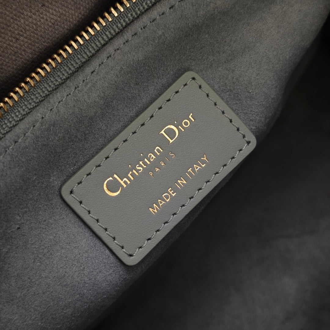 Dior interior label reading Christian Dior and Made in Italy on gray fabric