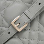 Dior quilted strap buckle with gold-tone metal, light blue