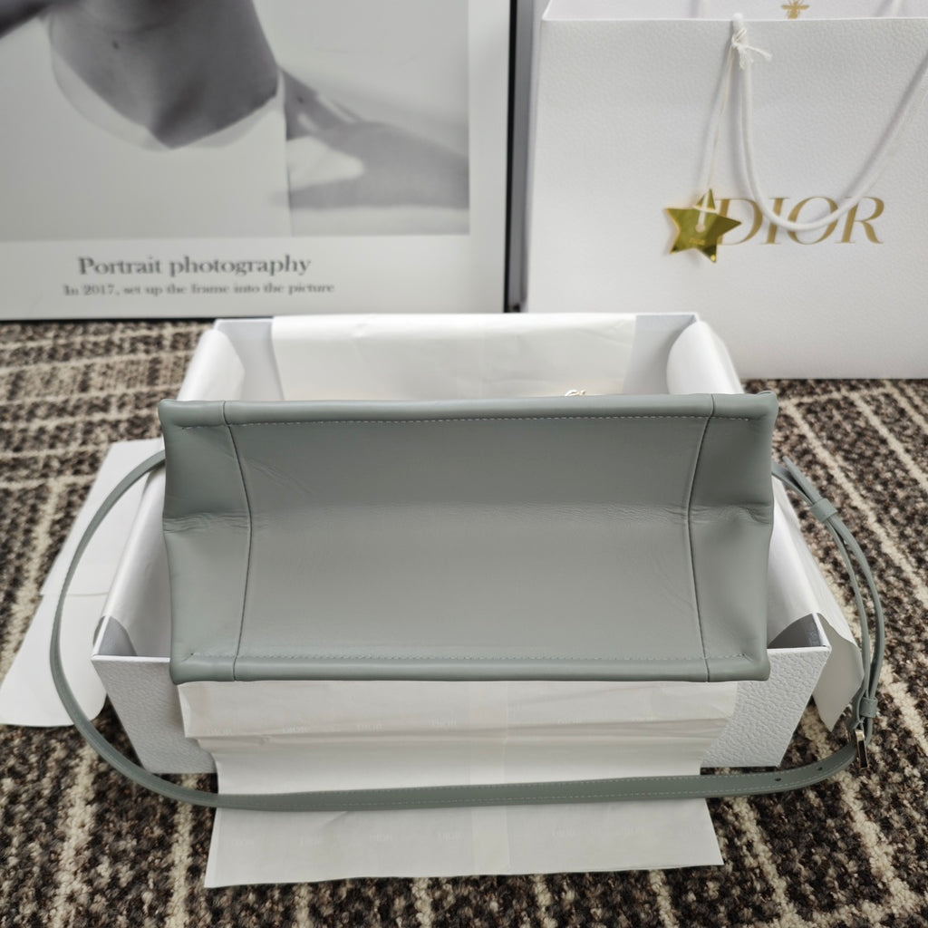 Dior structured bag with top zipper and smooth light-blue front panel