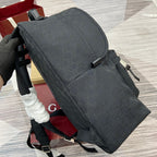 Monogram crossbody-style backpack with front flap and side zipper