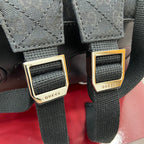 Gucci men's backpack shoulder strap with gold-tone buckle and textured fabric panel