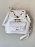 Chanel quilted leather flap bag with chain strap and gold-tone CC logo on front