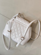 Chanel quilted leather top-handle shoulder bag with gold-tone ring hardware