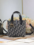 Dior small tote bag with navy Dior Oblique canvas and black leather handles
