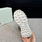 Burberry white studded outsole sole segment held in hand