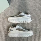 Burberry white sneakers with plaid uppers and studded tread sole