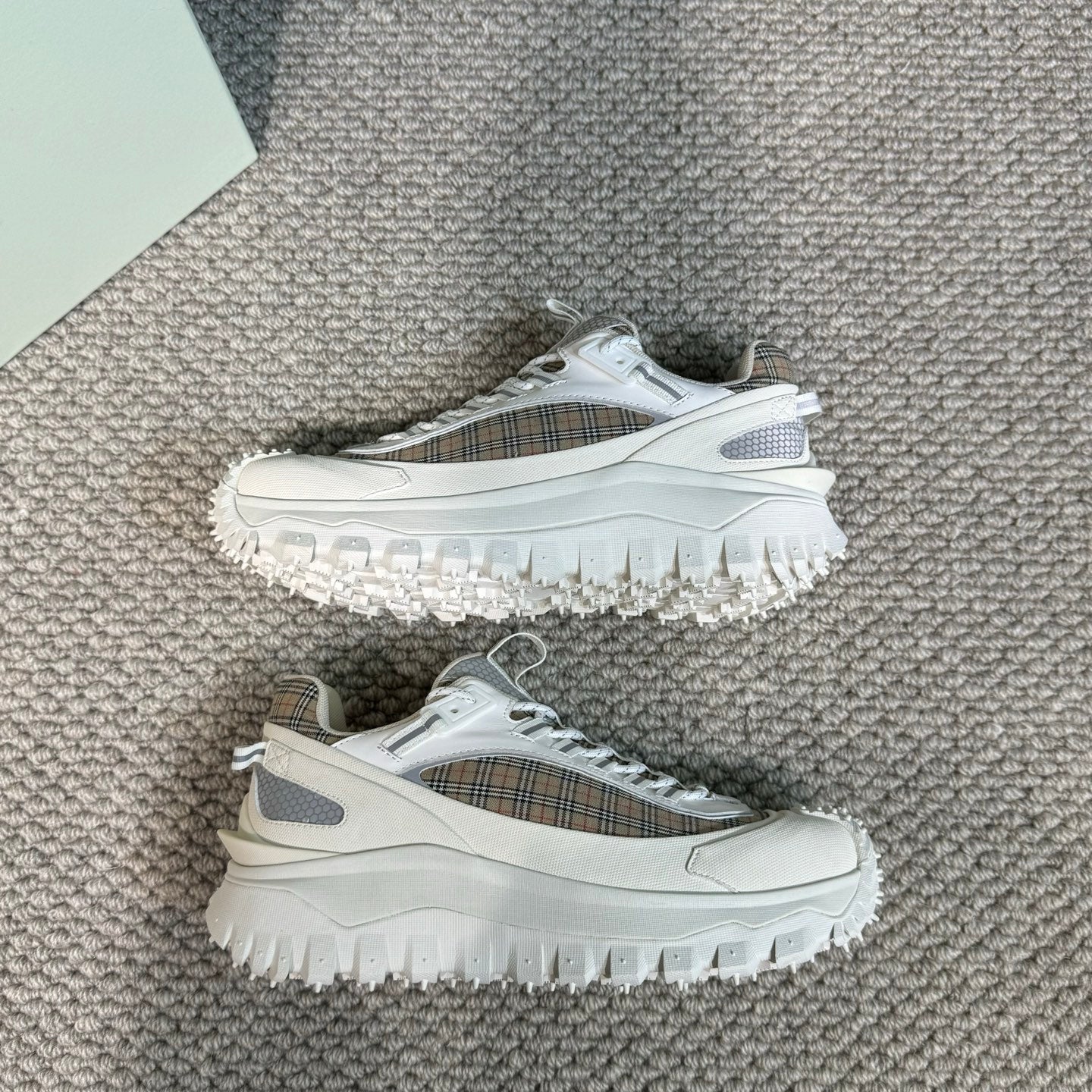 Burberry white sneakers with plaid uppers and studded tread sole