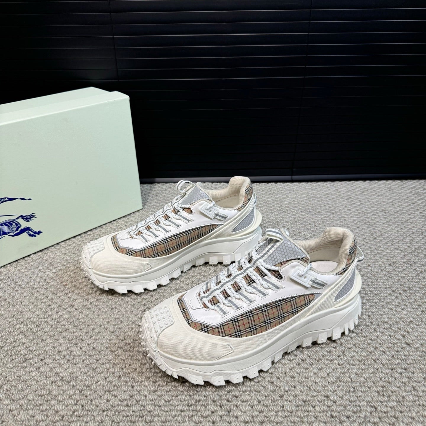 Burberry white lace-up sneakers with plaid accents and thick tread sole