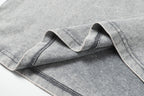 Light gray T-shirt sleeve seam and cuff stitching detail
