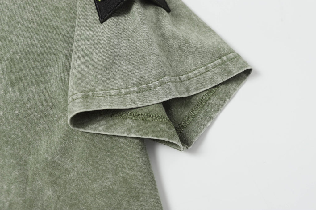 Sage green short-sleeve T-shirt hem with stitched sleeve cuff detail