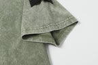 Sage green short-sleeve T-shirt hem with stitched sleeve cuff detail