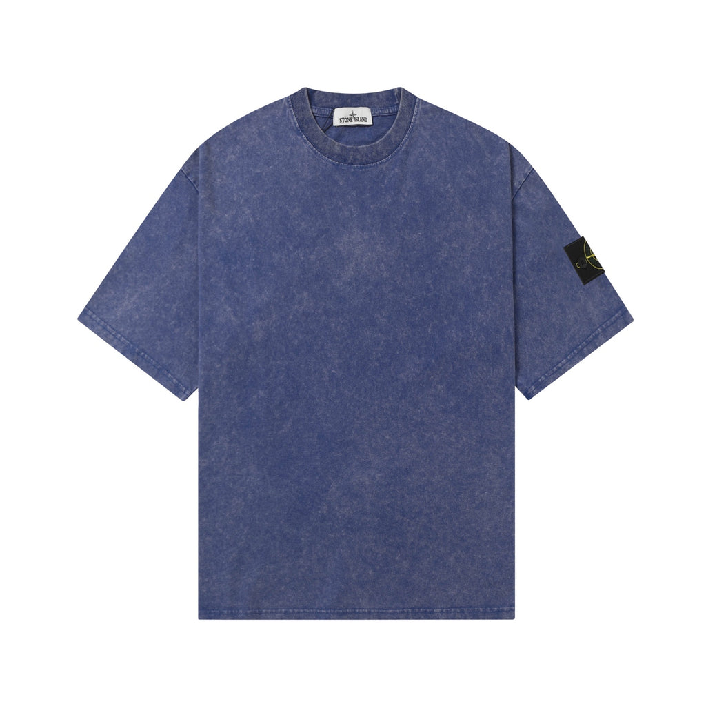 Blue crew-neck T-shirt, short sleeves, Stone Island sleeve patch.