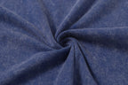 Blue T-shirt fabric with draped fold texture.