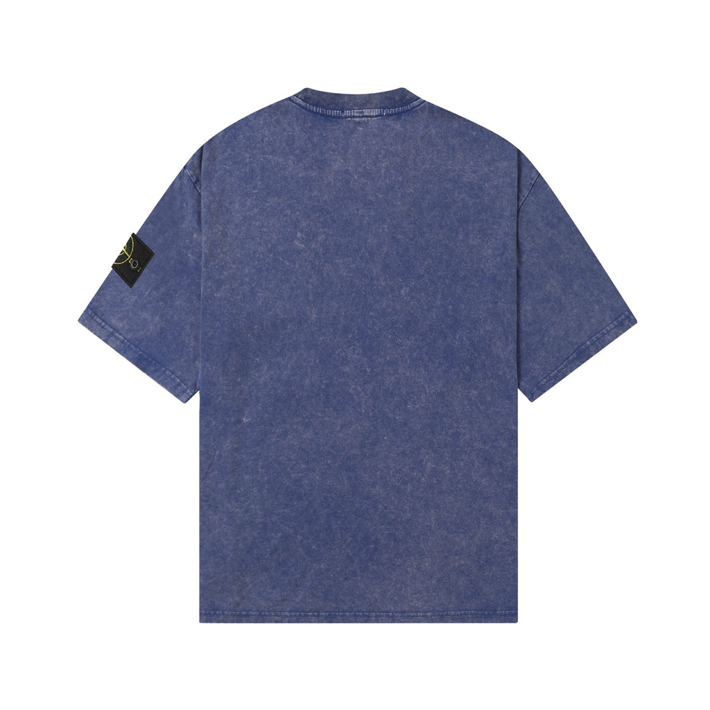 Blue crew-neck T-shirt, back view, short sleeves, Stone Island sleeve patch.
