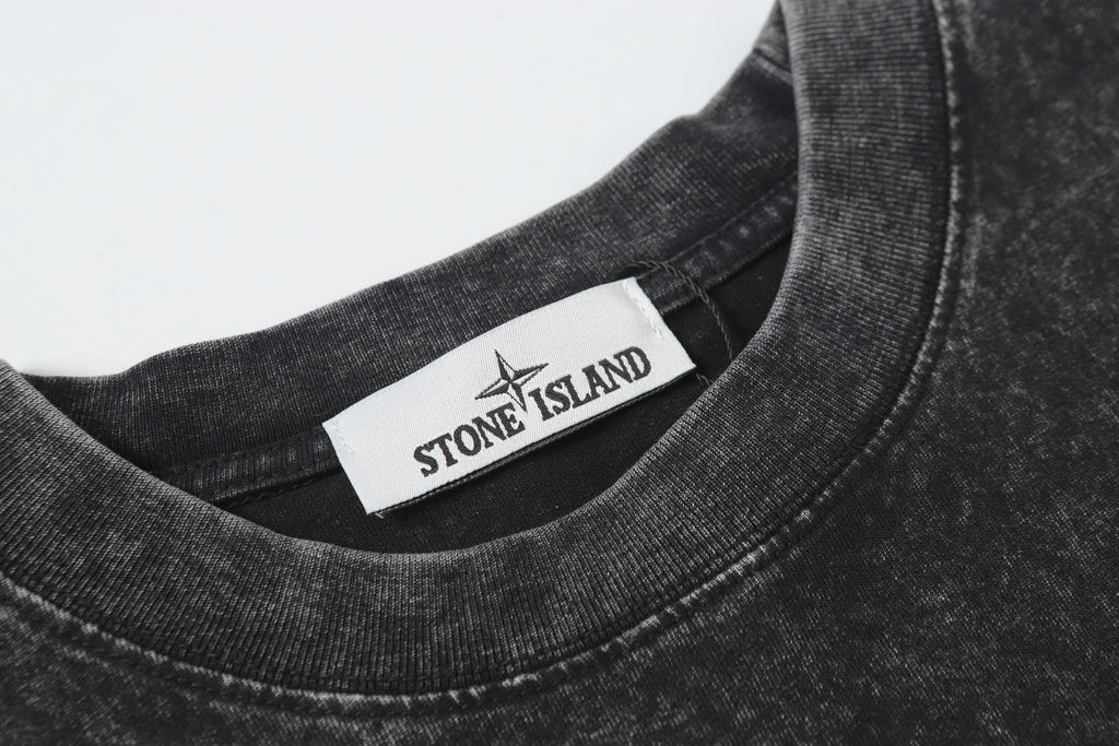 Dark charcoal crewneck T-shirt collar with brand neck label