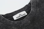 Dark charcoal crewneck T-shirt collar with brand neck label