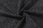Dark charcoal T-shirt fabric knot with heathered speckle weave texture