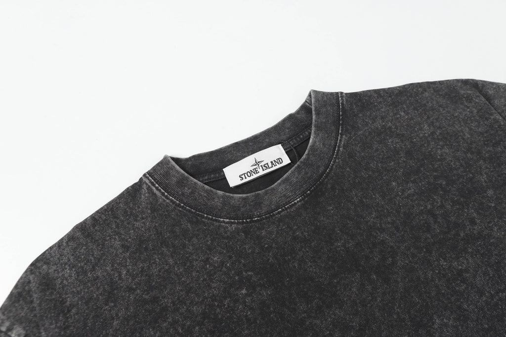 Dark charcoal crewneck T-shirt with inner neck label visible