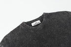Dark charcoal crewneck T-shirt with inner neck label visible