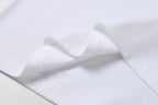 White Stone Island T-shirt hem with double-stitched seam detail.