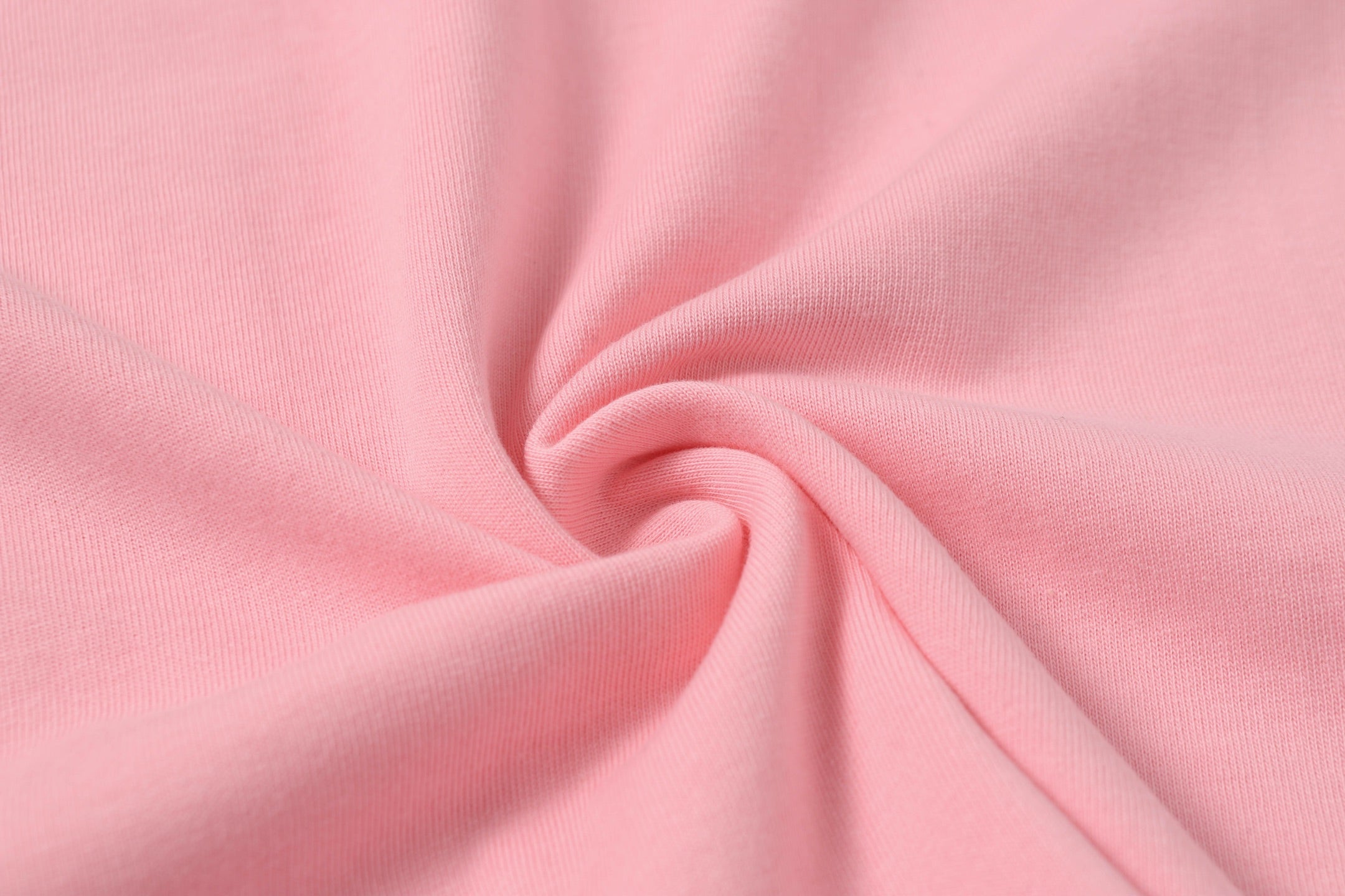 Pink T-shirt knit fabric showing soft texture