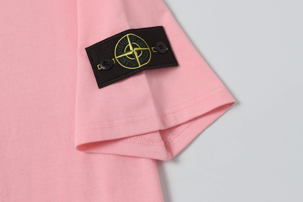 Pink T-shirt sleeve with black patch and short cuff hem