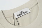Light beige crew-neck collar with interior label