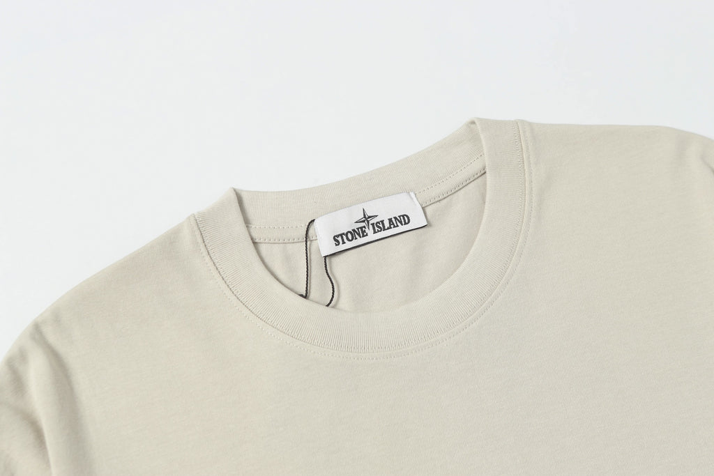 Light beige crew-neck T-shirt with collar label at neckline