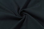 Stone Island T-shirt fabric close-up showing knit texture in dark color