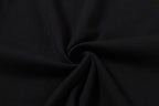 Black T-shirt fabric close-up, smooth knit texture