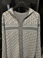 Front of gray zip hoodie with Dior monogram yoke and hood