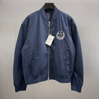 Navy bomber jacket with Dior crest patch, full zip front, ribbed collar and cuffs.