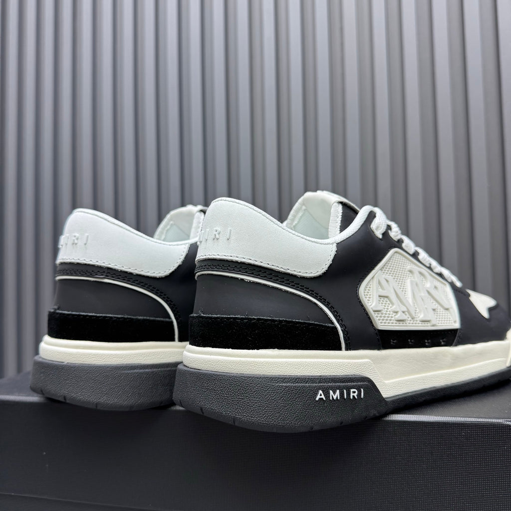 Amiri low-top sneakers, heel and side view in black and white with thick sole