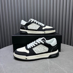 Amiri lace-up sneakers set, black upper with white panels and raised logo emblem