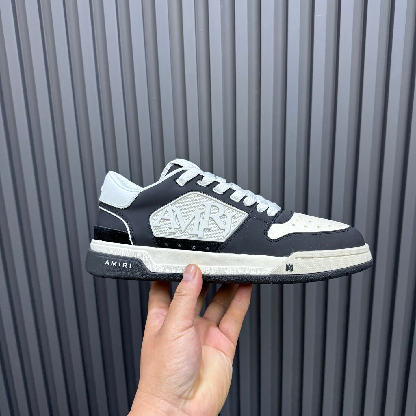 Amiri lace-up sneakers, black upper with white toe and large logo patch