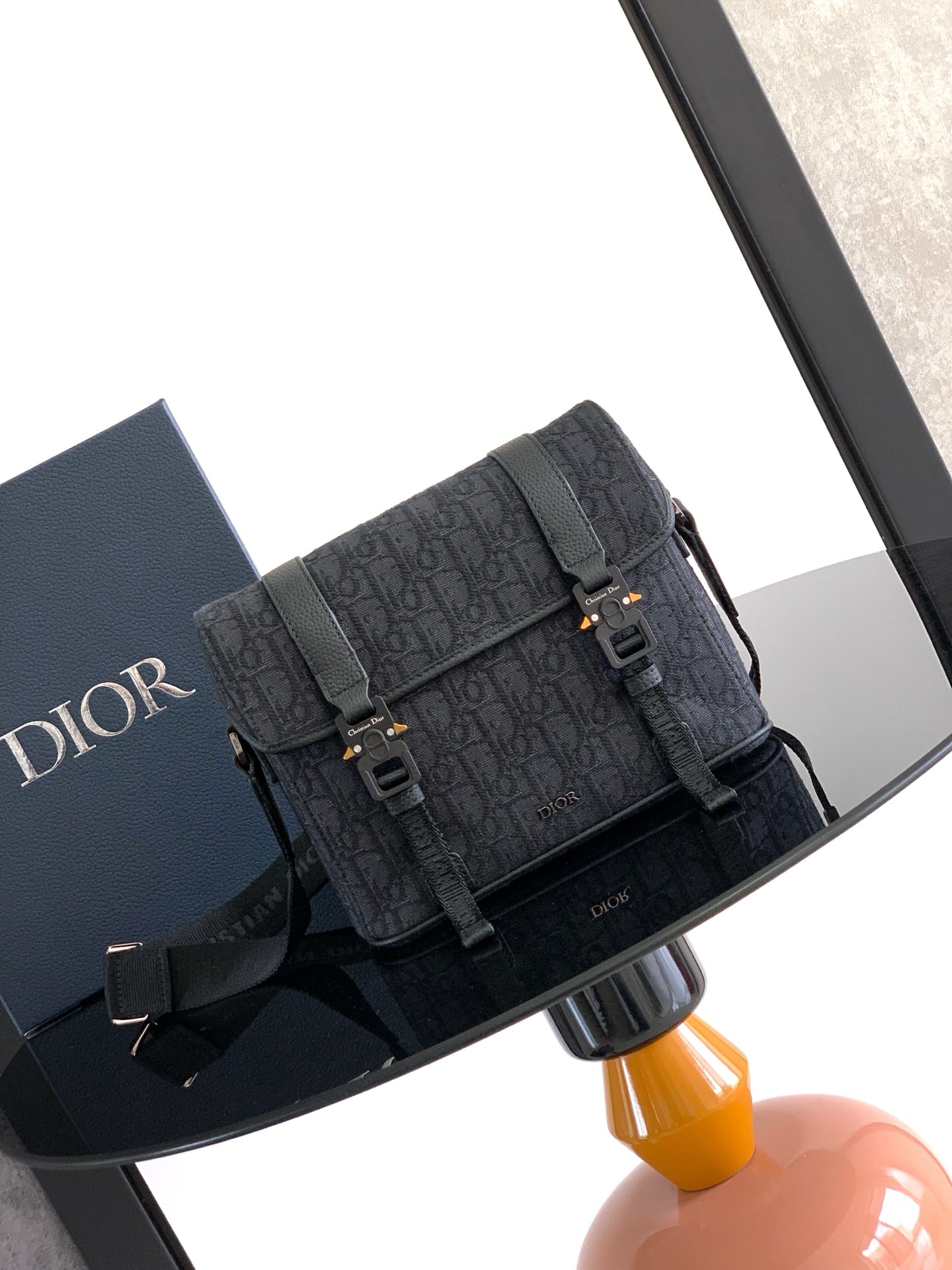 Dior small crossbody bag in dark gray monogram canvas with front flap and buckle