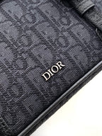 Dior monogram crossbody flap detail in dark gray fabric with stitched logo patch