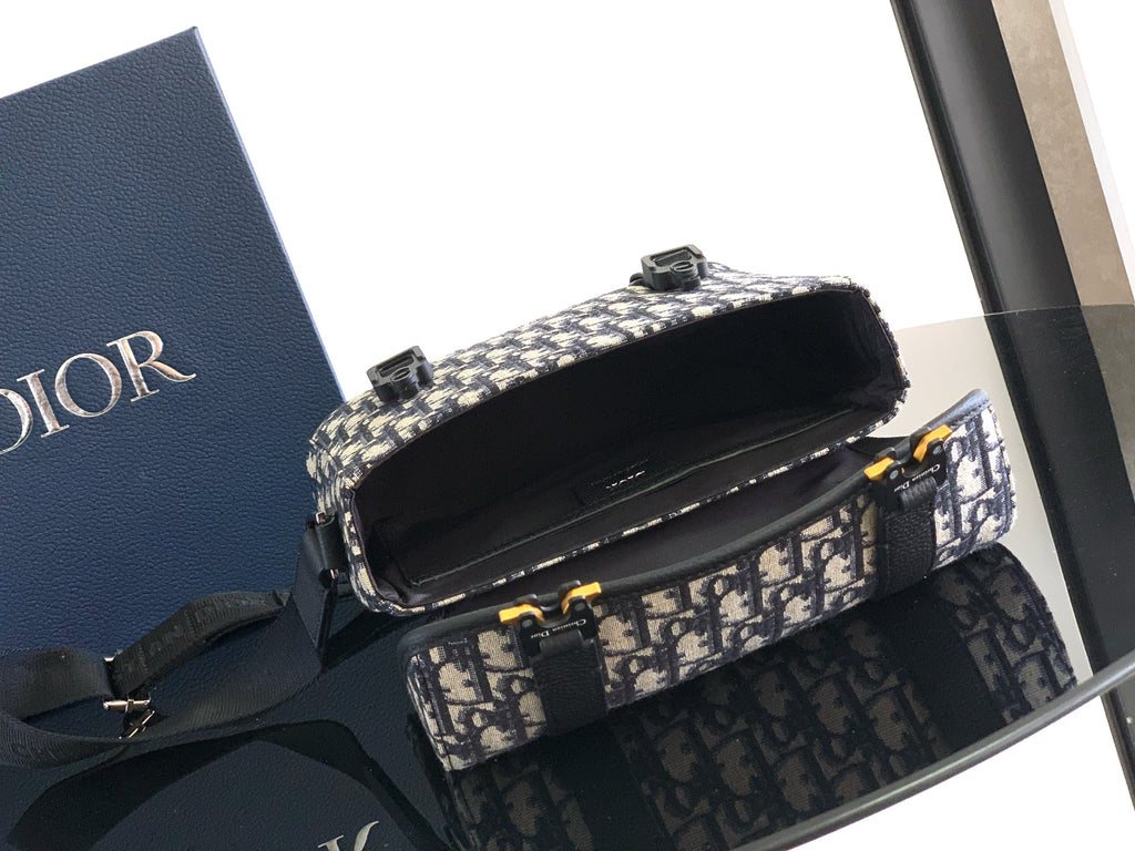Dior bag with Dior monogram canvas and flap top, showing black interior lining