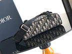 Dior bag with Dior monogram canvas, black front strap and silver-tone buckle