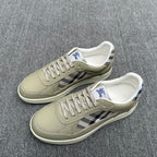 Burberry low-top sneakers, beige uppers with check stripe and blue logo tongue