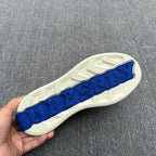 Burberry sneaker outsole, white tread with blue logo strip