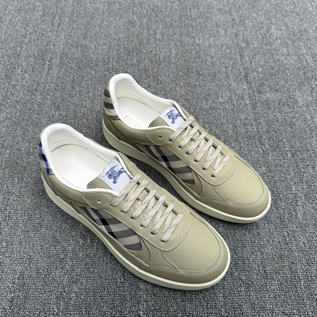 Burberry low-top sneakers pair, beige leather with check detail and blue accents