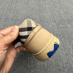 Burberry beige sneaker heel view, check band and textured platform sole