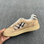 Burberry beige low-top sneaker side view, check stripe and blue logo detail
