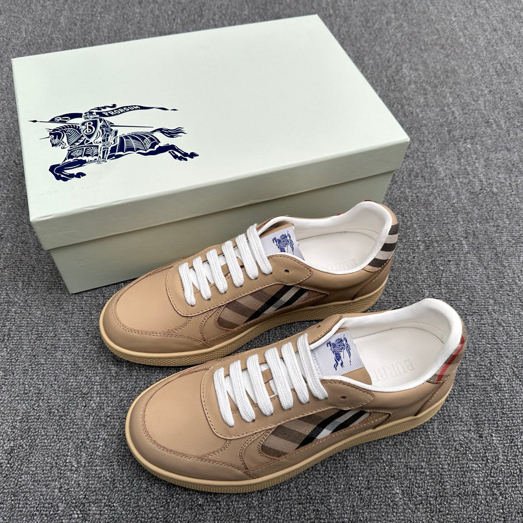 Burberry sneakers with check panel, white laces, beside logo shoebox