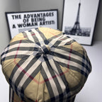 Burberry plaid baseball cap top close-up with button detail