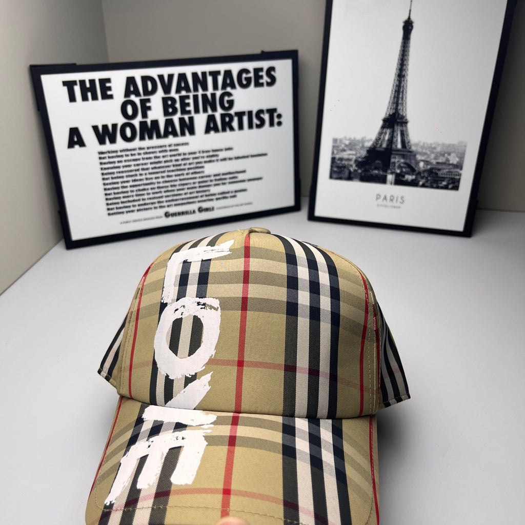 Burberry baseball cap in beige, navy and red plaid with white #9 lettering across front
