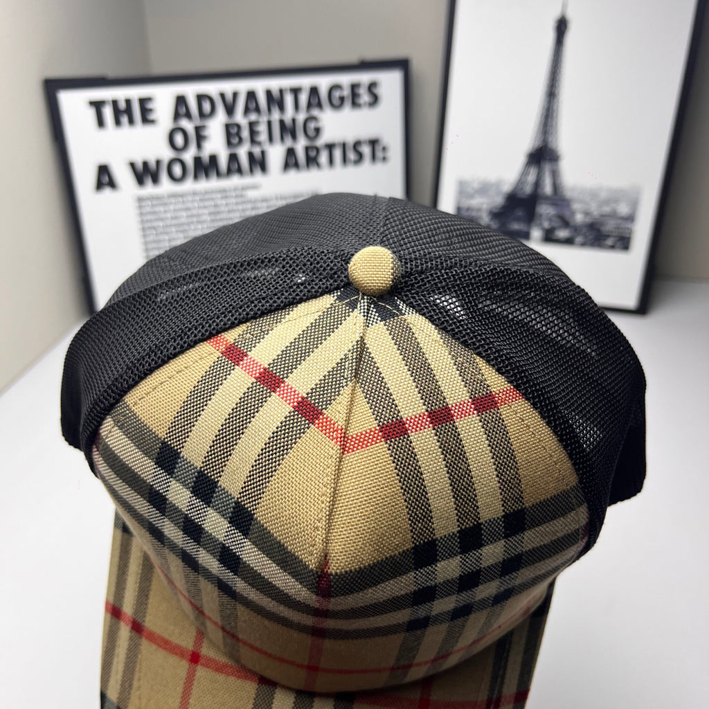Burberry cap back view with beige, navy and red plaid crown and black mesh exterior